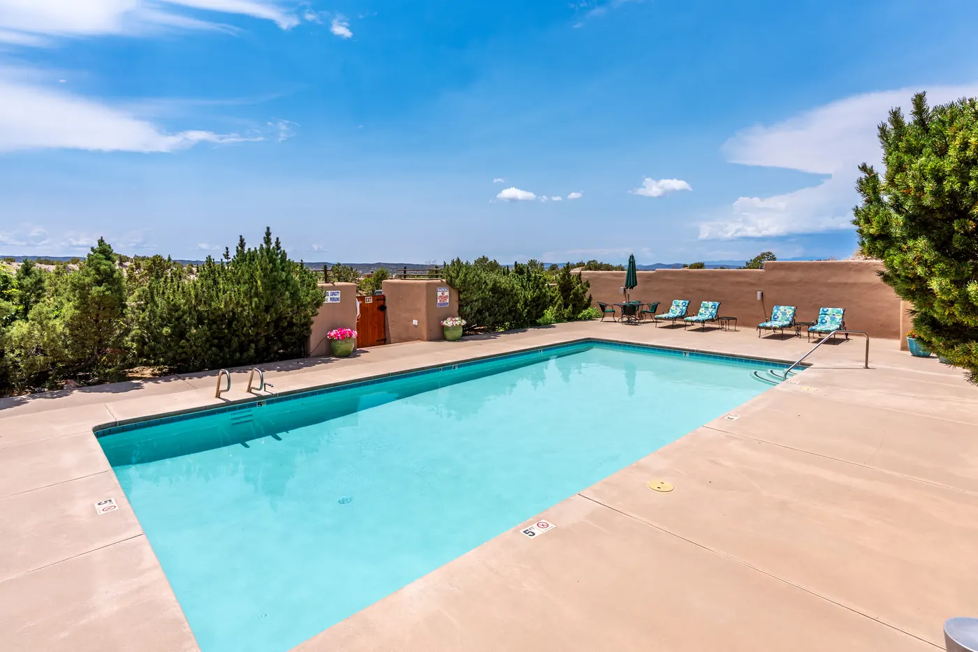 Community pool with sweeping mountain views